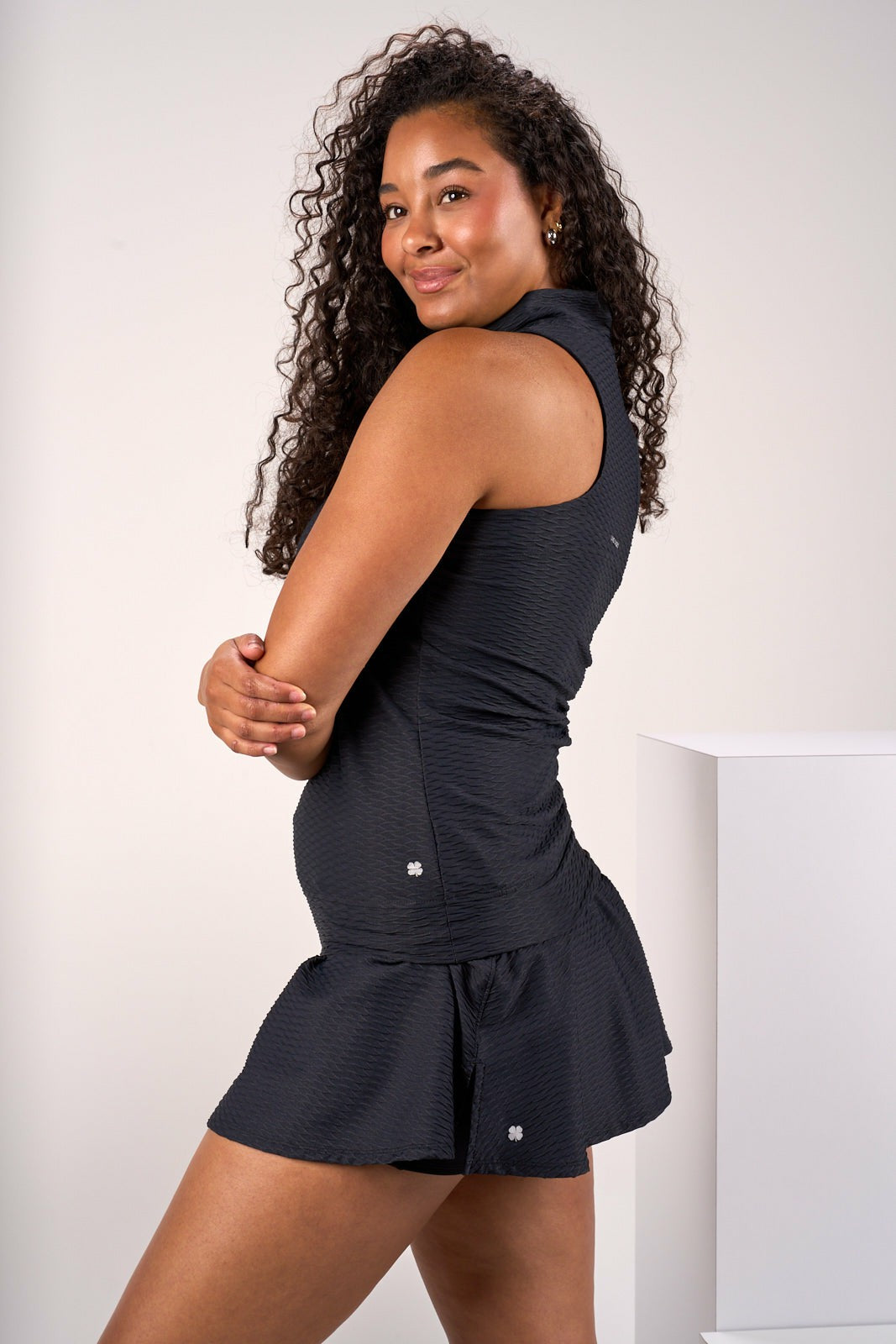 Women's Sleeveless Black Polo for Golf or Tennis