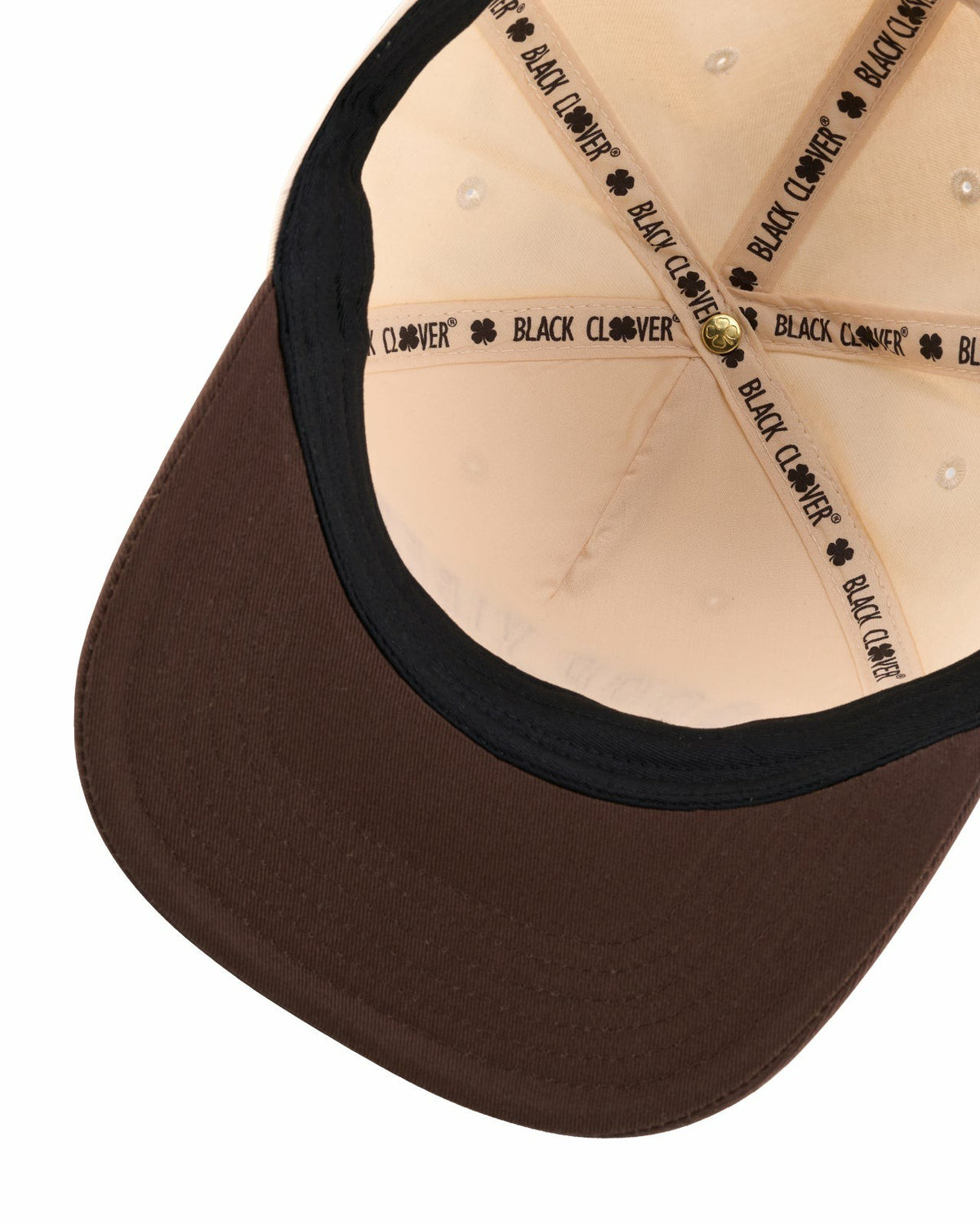 Vintage-Inspired Tan Hat with Brown Brim