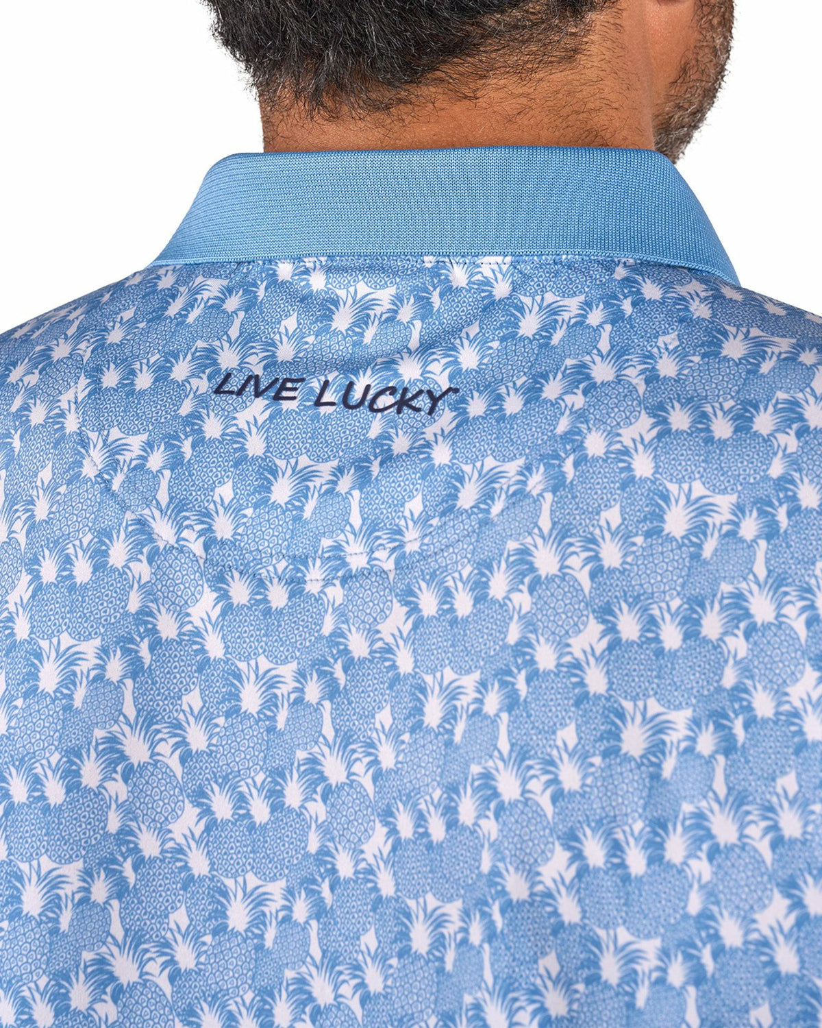 Soft Blue Pineapple-Print Tropical Polo for Vacation or Golf