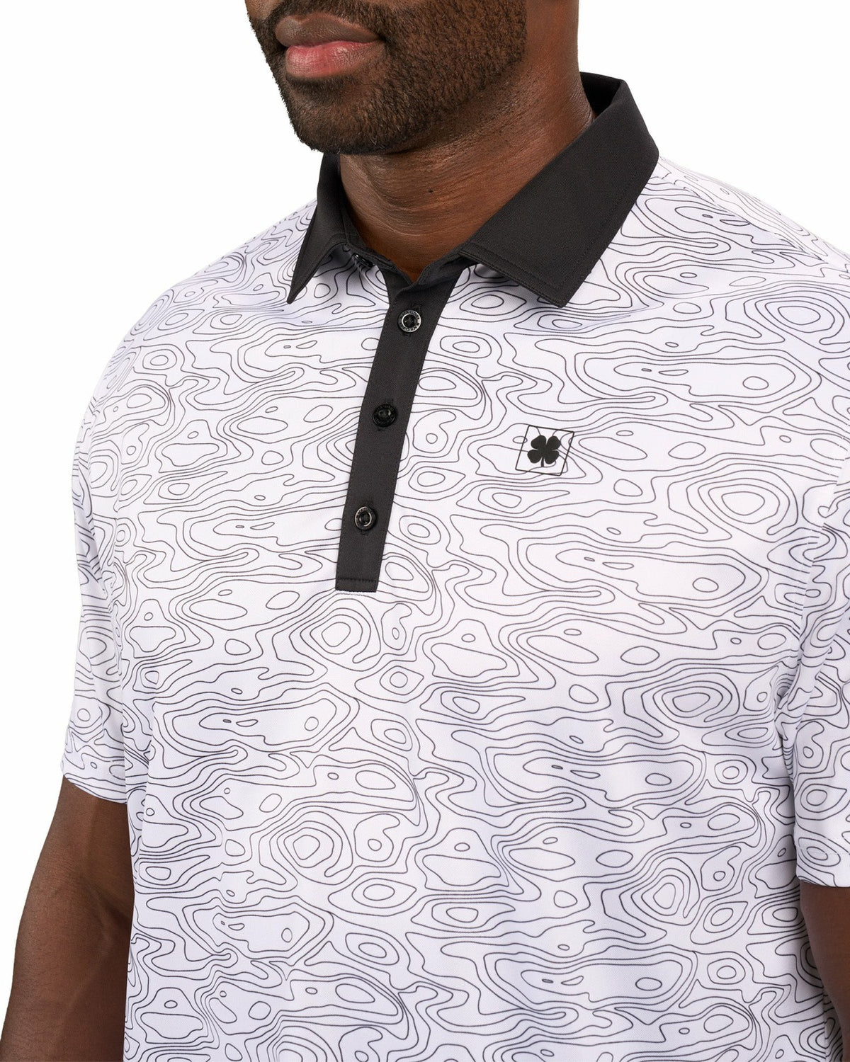 Modern Black and White Patterned Golf Polo with Black Collar and Placket