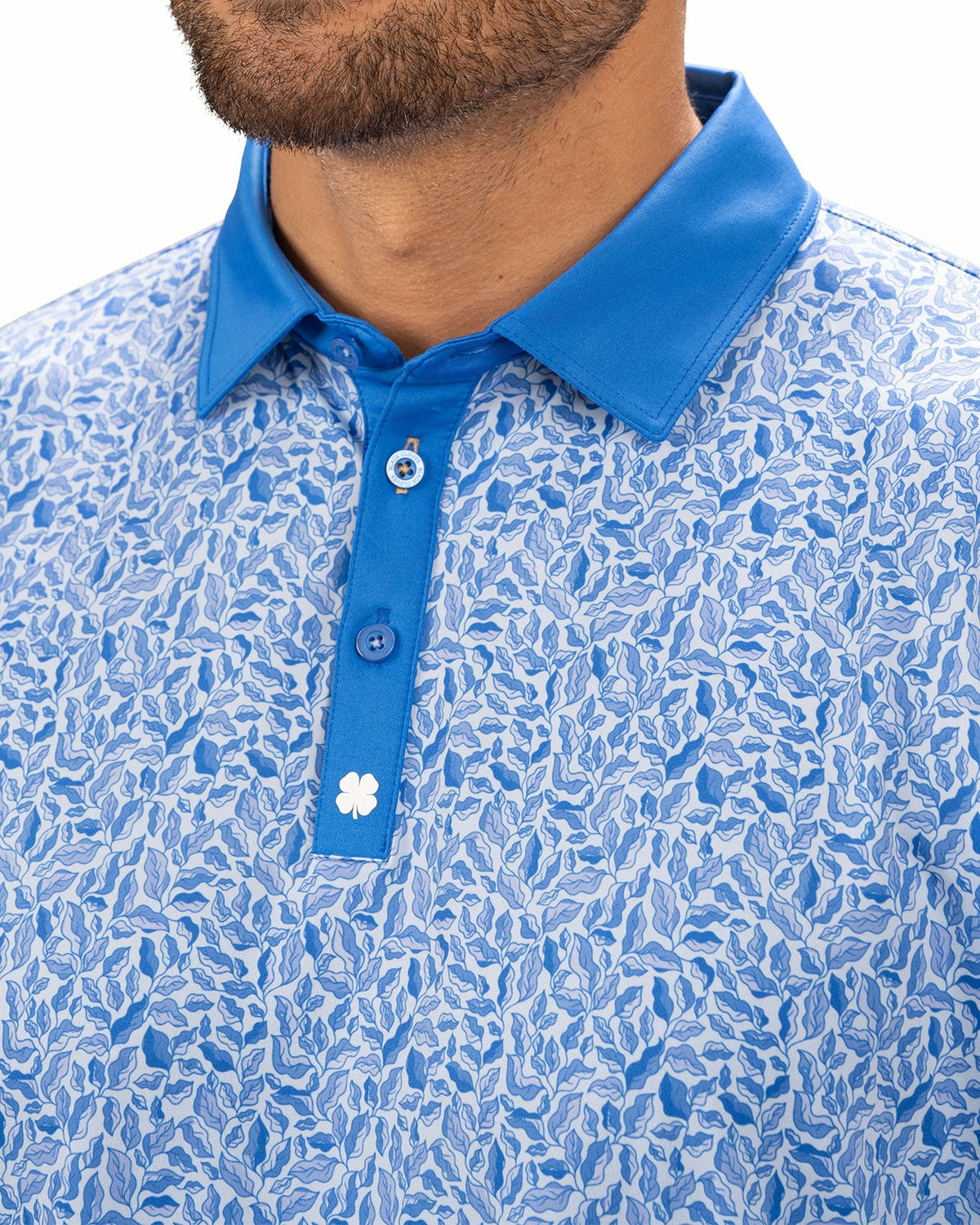 Stylish Floral-Patterned Men's Golf Polo with Solid Blue Collar and Placket