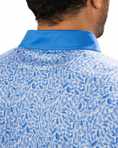 Stylish Floral-Patterned Men's Golf Polo with Solid Blue Collar and Placket