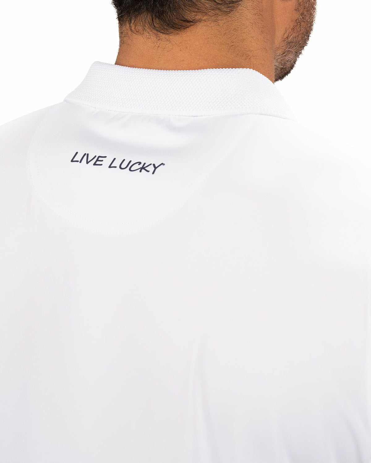 Solid White Golf or Business Polo with Black Clover Embellishment