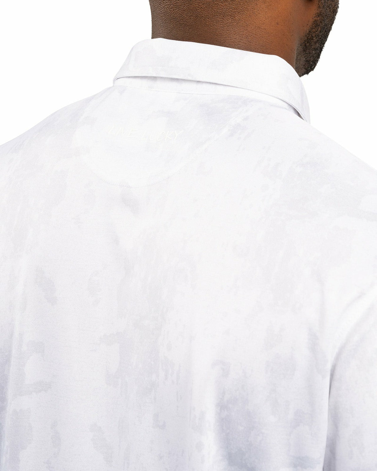 Stylish Tone-on-Tone White Polo, Perfect for On the Course or On the Town