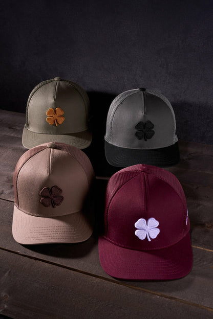 Brown Adjustable Hat with Mesh Back and Embroidered Clover