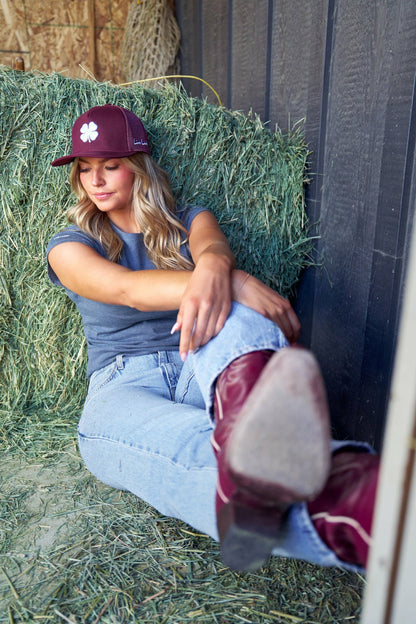 Dark Red Adjustable Hat with Mesh Back and White Embroidered Clover