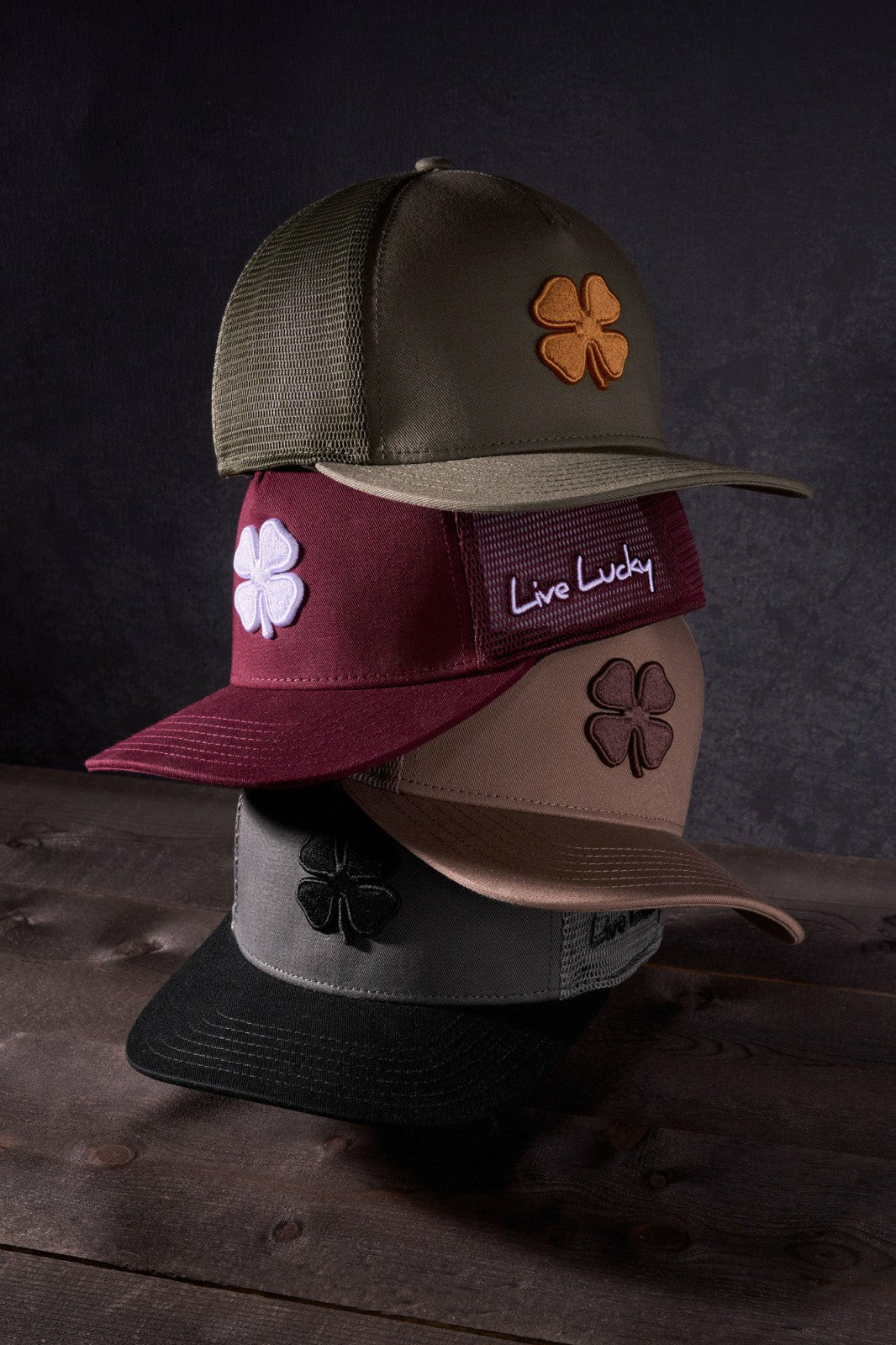 Dark Red Adjustable Hat with Mesh Back and White Embroidered Clover