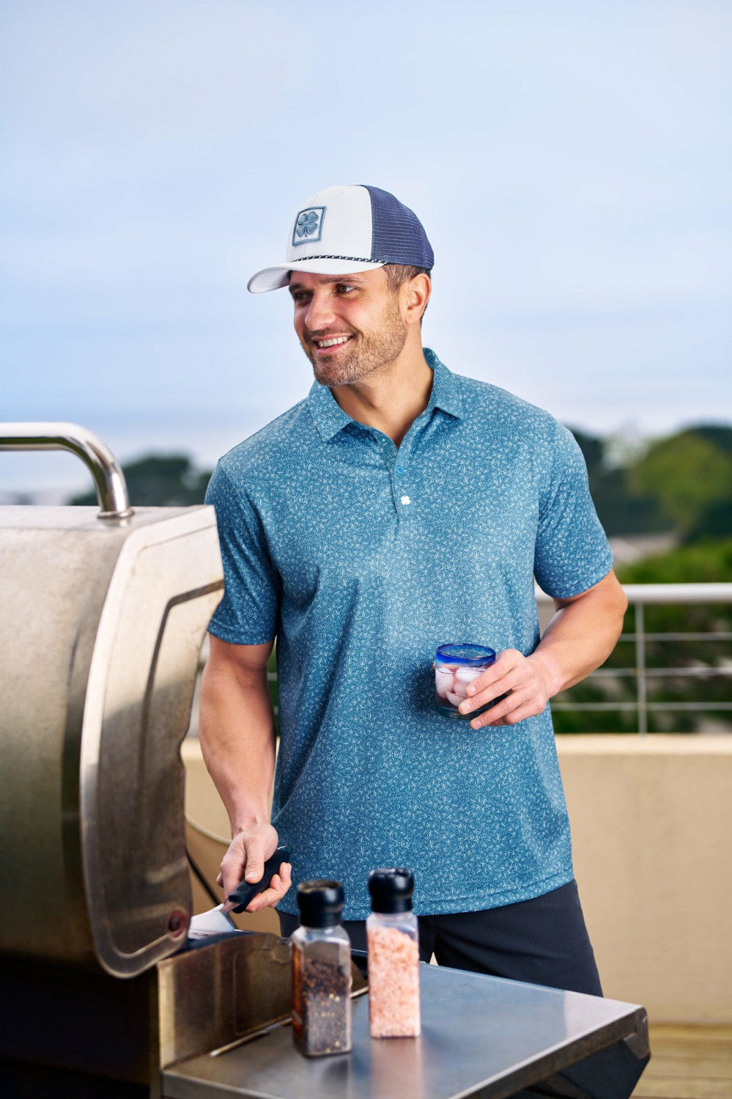 White and Blue Mesh Golf Hat with Clover Icon
